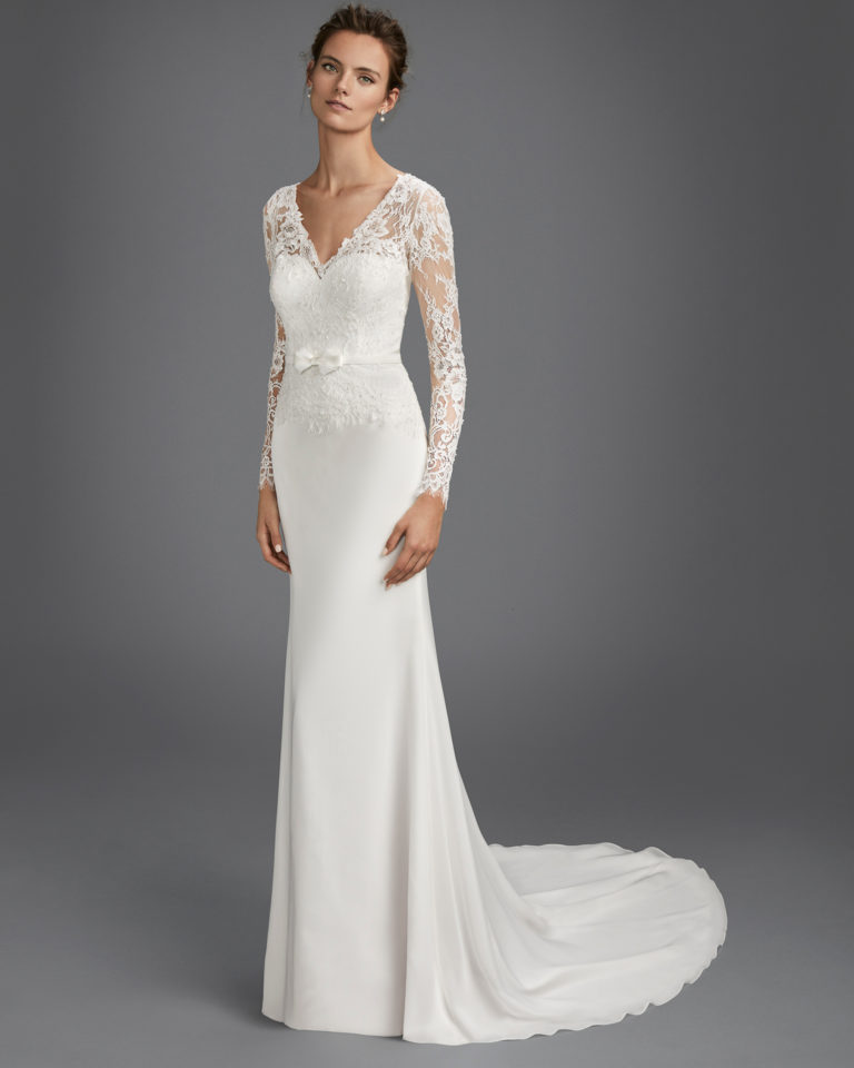 Mermaid-style beaded lace and chiffon wedding dress with long sleeves and V-back.