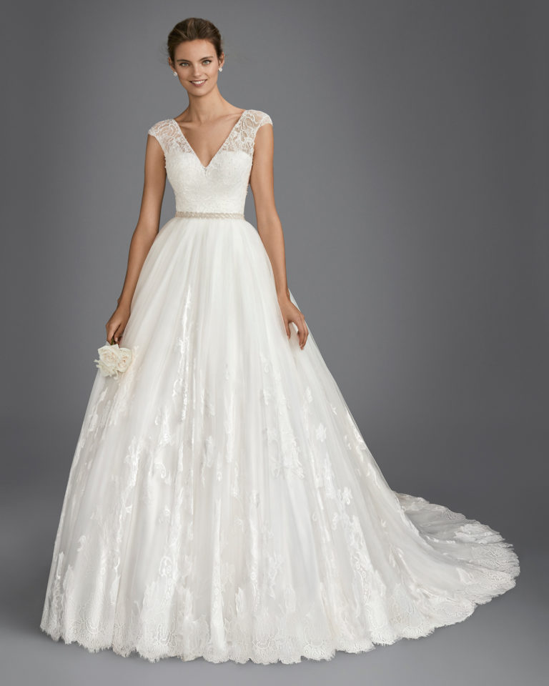 A-line beaded lace and tulle wedding dress with V-neckline and low back, in natural and white.