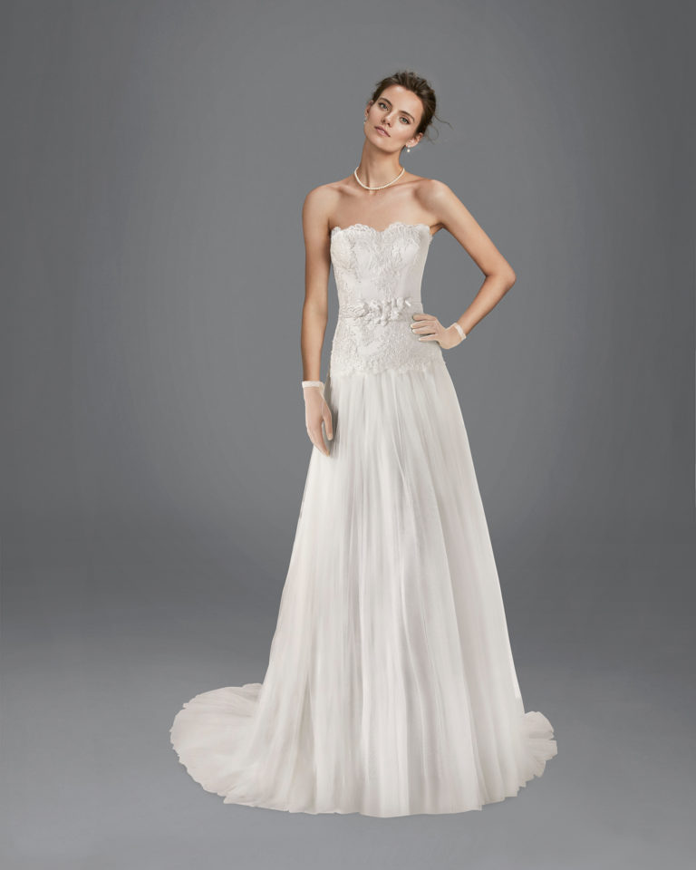 Beaded lace and soft tulle wedding dress, in natural and white.