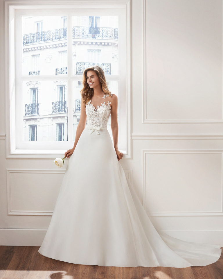 Classic A-line organza wedding dress Beaded lace bodice with illusion neckline. Available in natural. 2019  Collection.