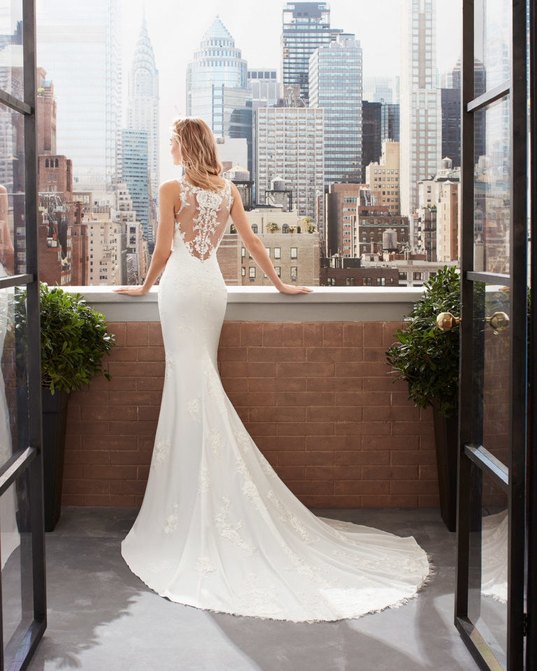 Mermaid-style wedding dress in stretch crepe and lace with tattoo-effect back. 2020  Collection.