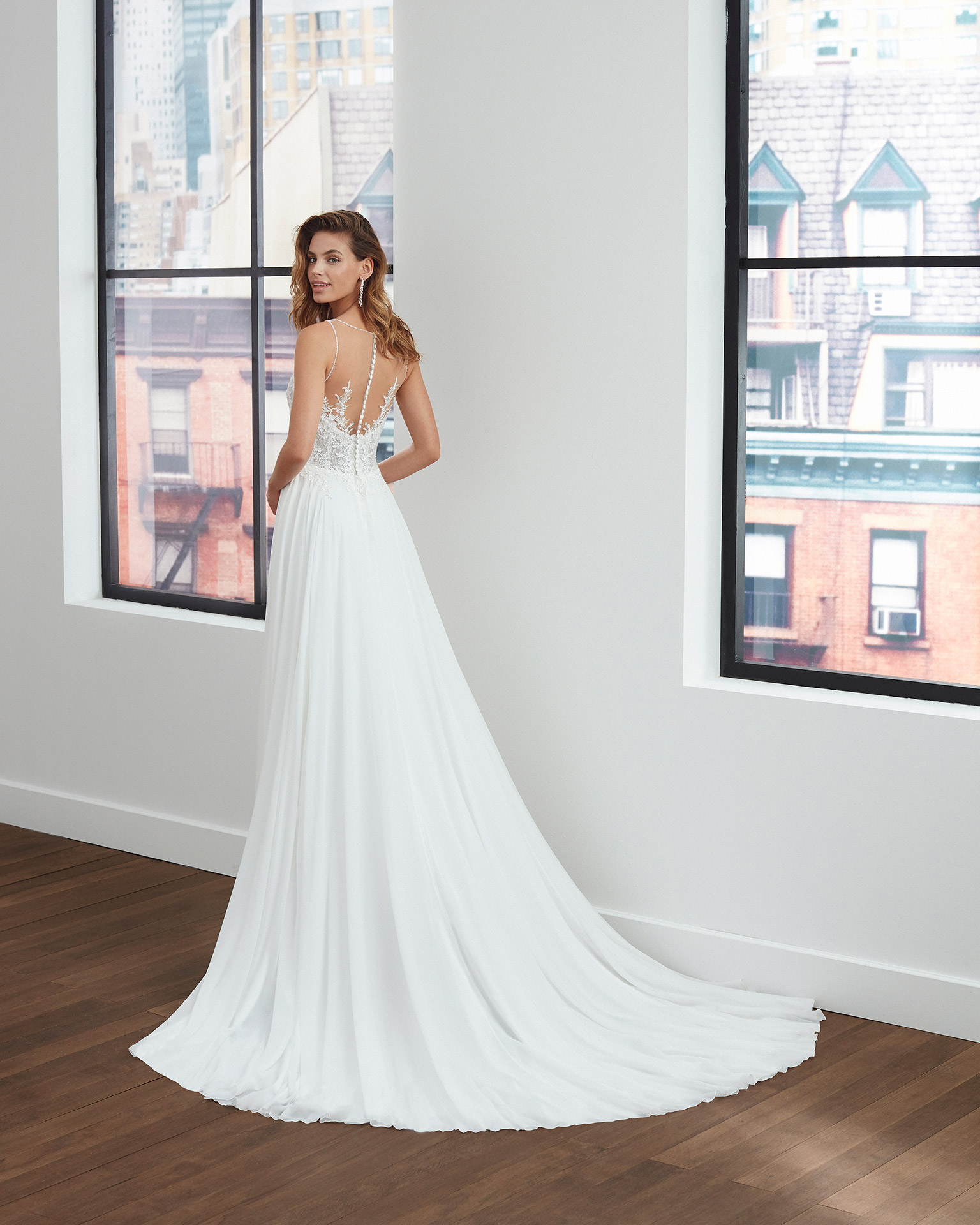 Peau d'ange voile wedding dress with pleats at the waist, deep-plunge neckline and back with sheer inserts. 2020  Collection.