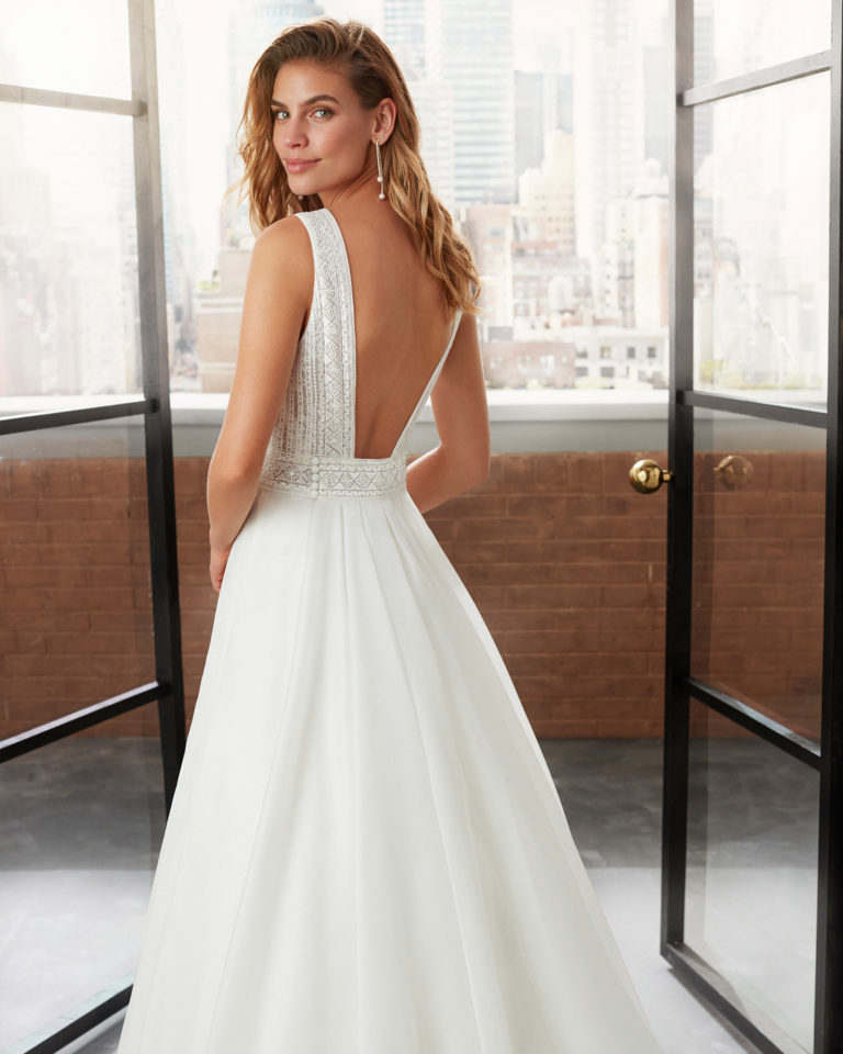 A-line organza and lace wedding dress and train with beading, V-neckline and square back. 2020 Collection.