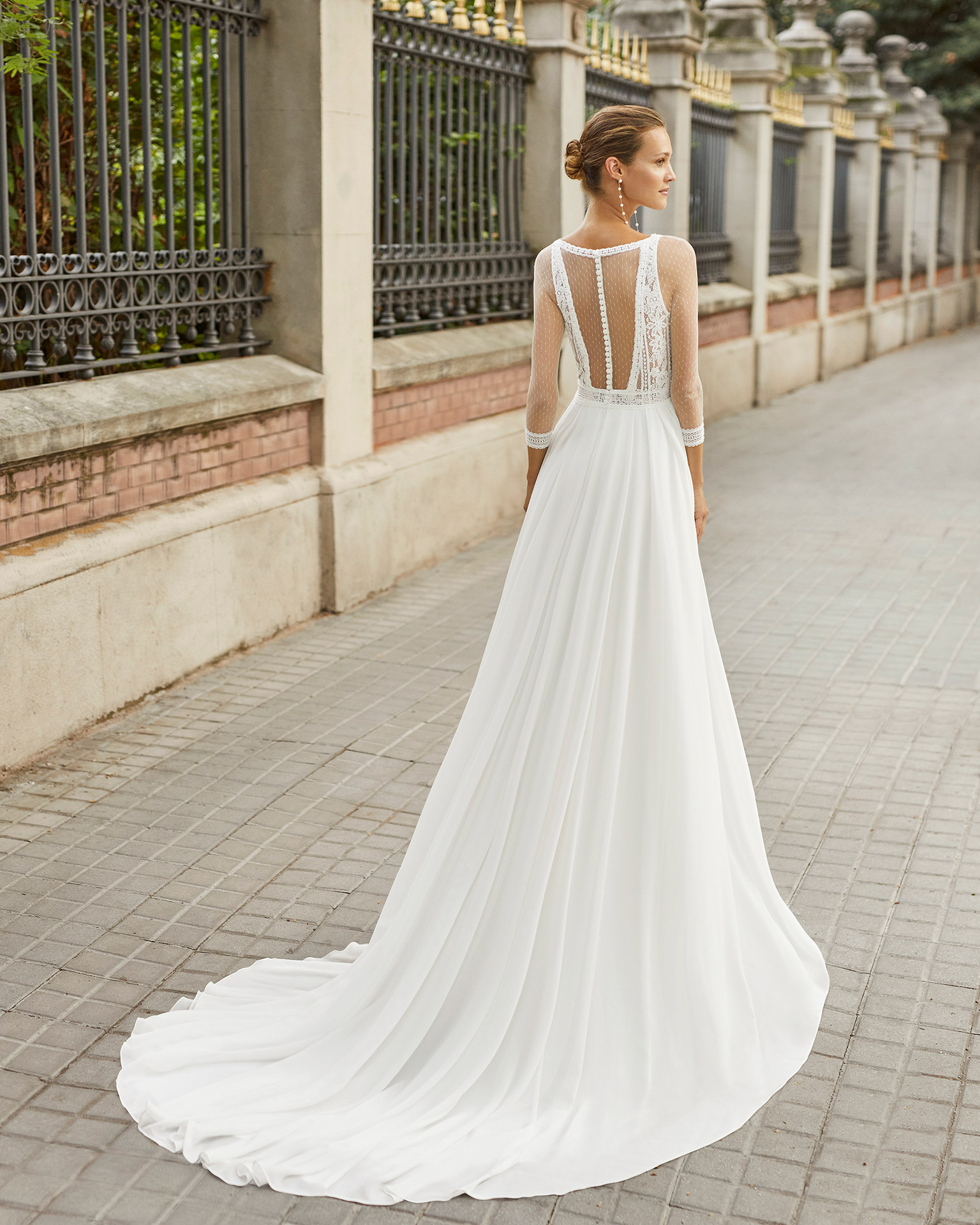 Lightweight wedding dress in georgette and beaded lace. V-neck, 3/4-length sleeves and sheer back. 2022  Collection.