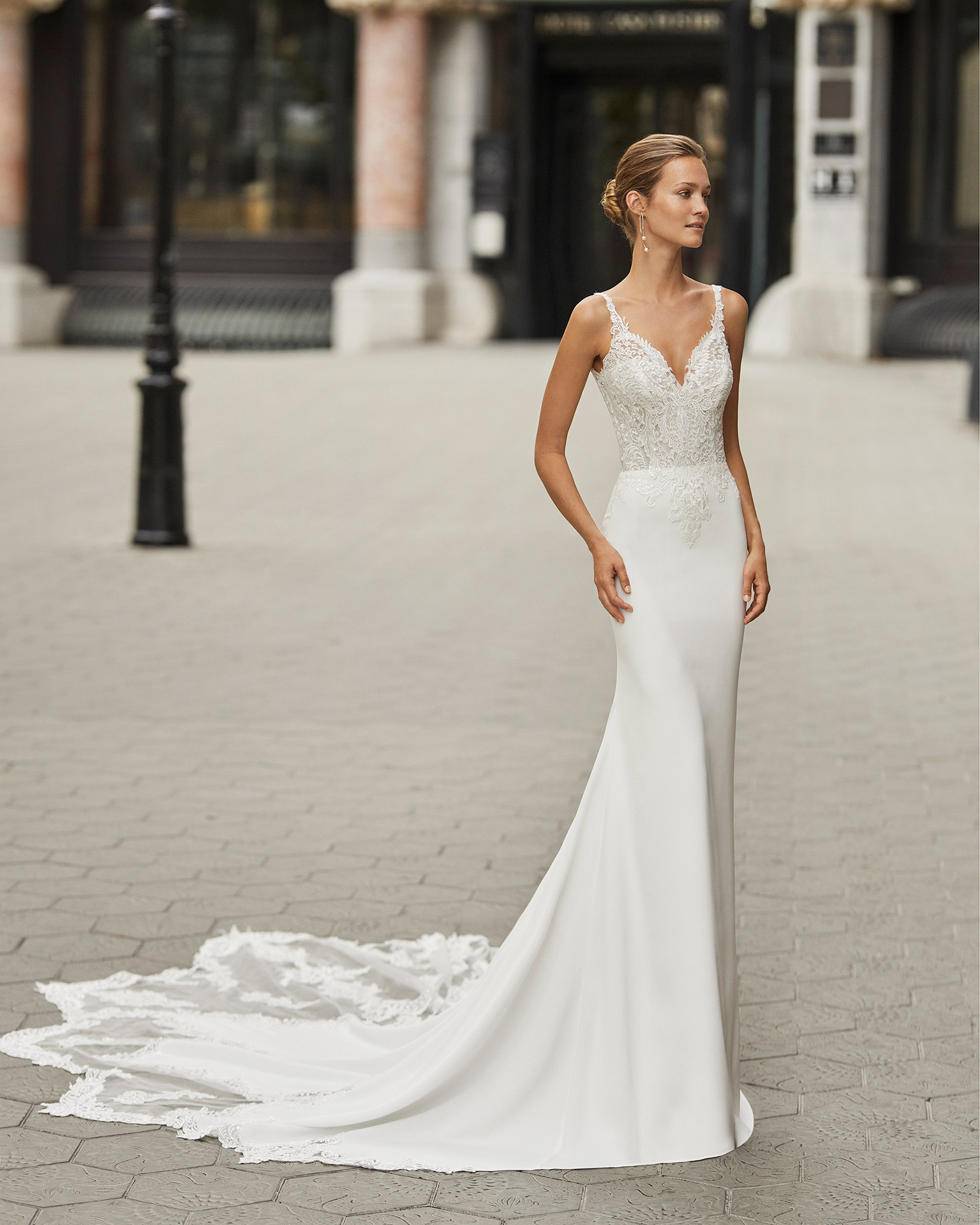 Mermaid wedding dress in stretch crepe with shaping lining and beaded lace. V-neckline and low back. 2022  Collection.