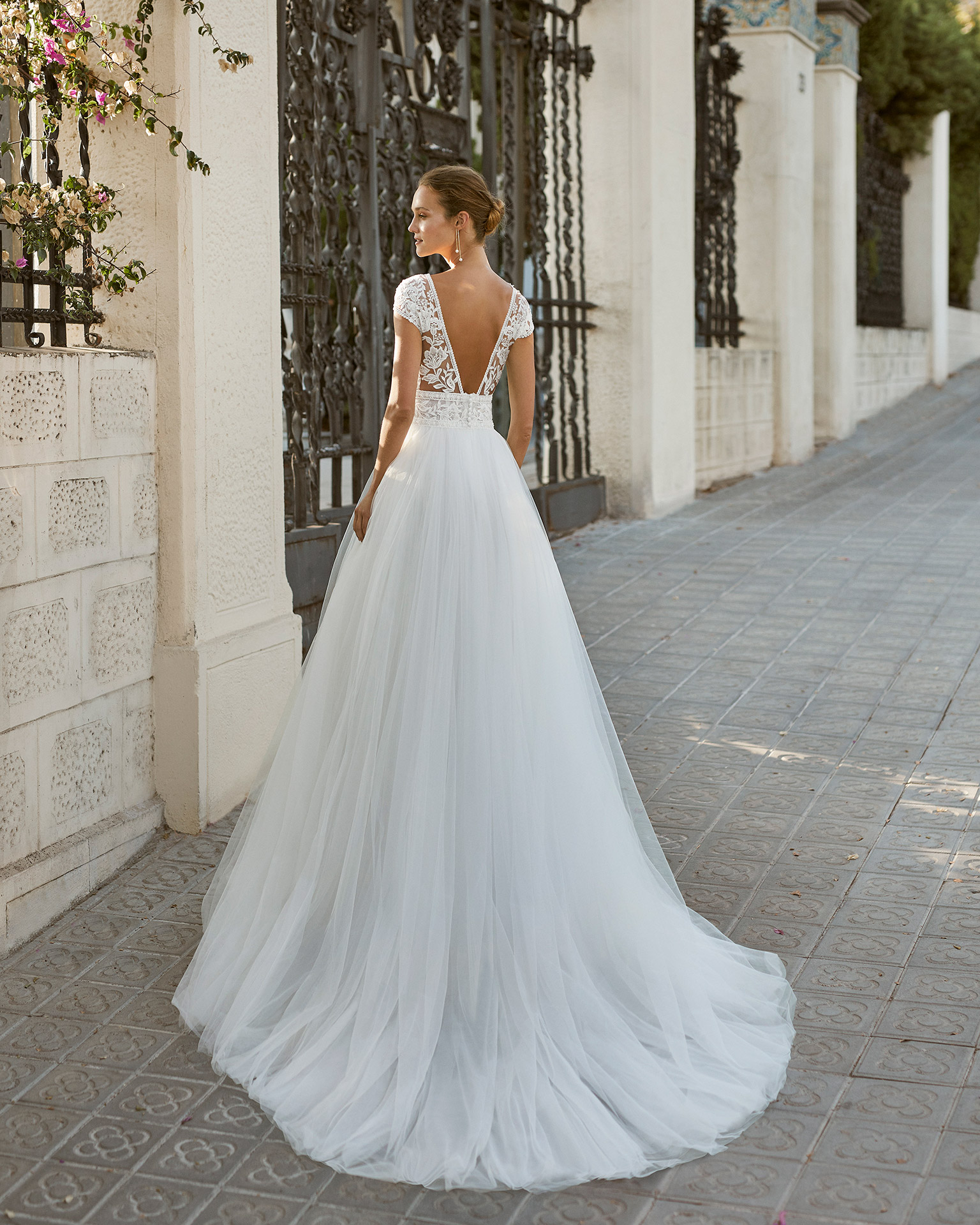 Romantic wedding dress, tulle, lace and beaded neckline, back, armholes and waist. With V-neck and V-back. 2022  Collection.