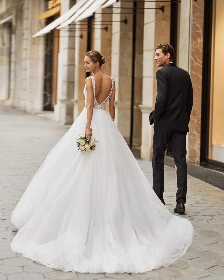 Romantic wedding dress, beaded tulle. Deep-plunge neckline and V-back. 2022  Collection.