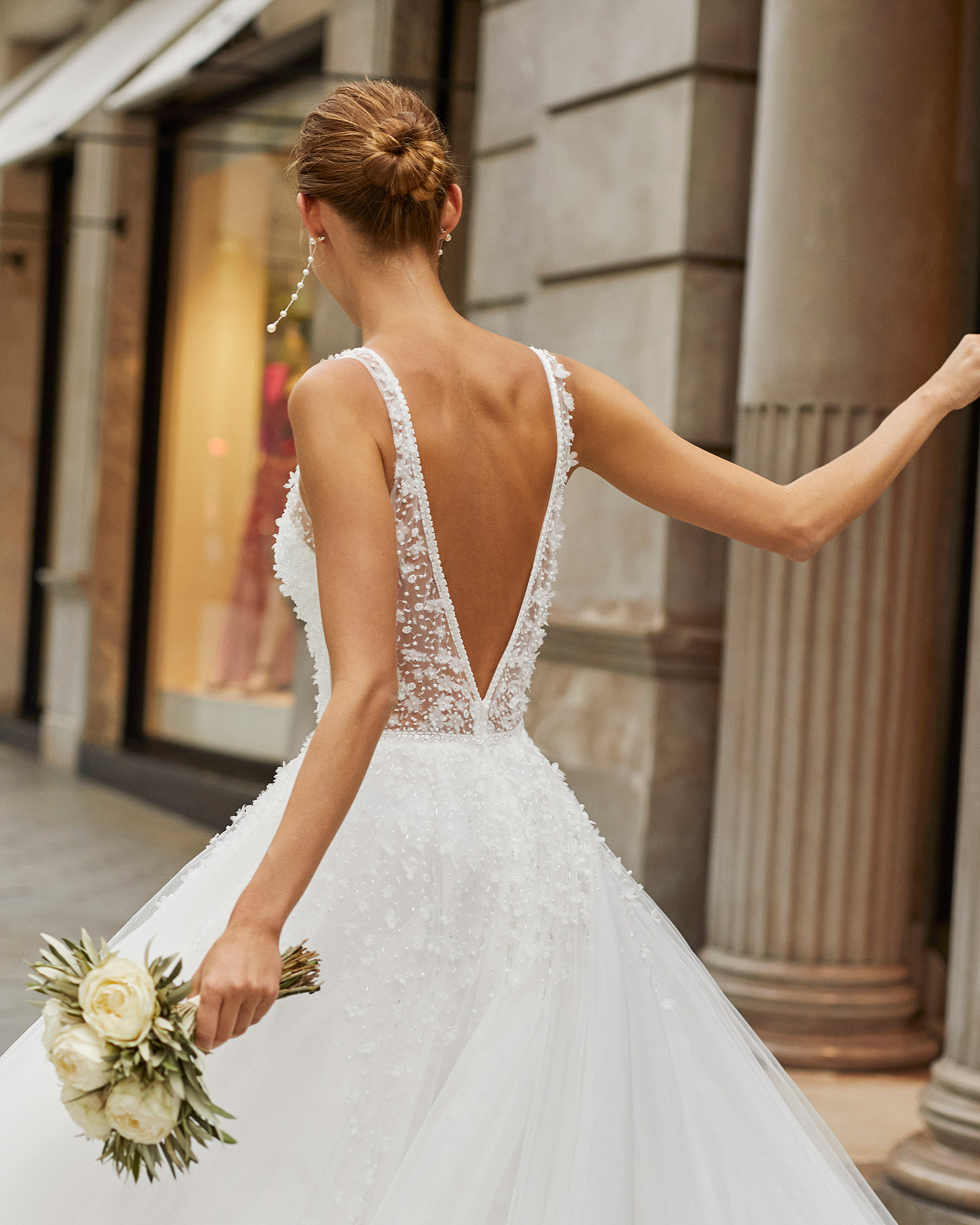 Romantic wedding dress, beaded tulle. Deep-plunge neckline and V-back. 2022  Collection.