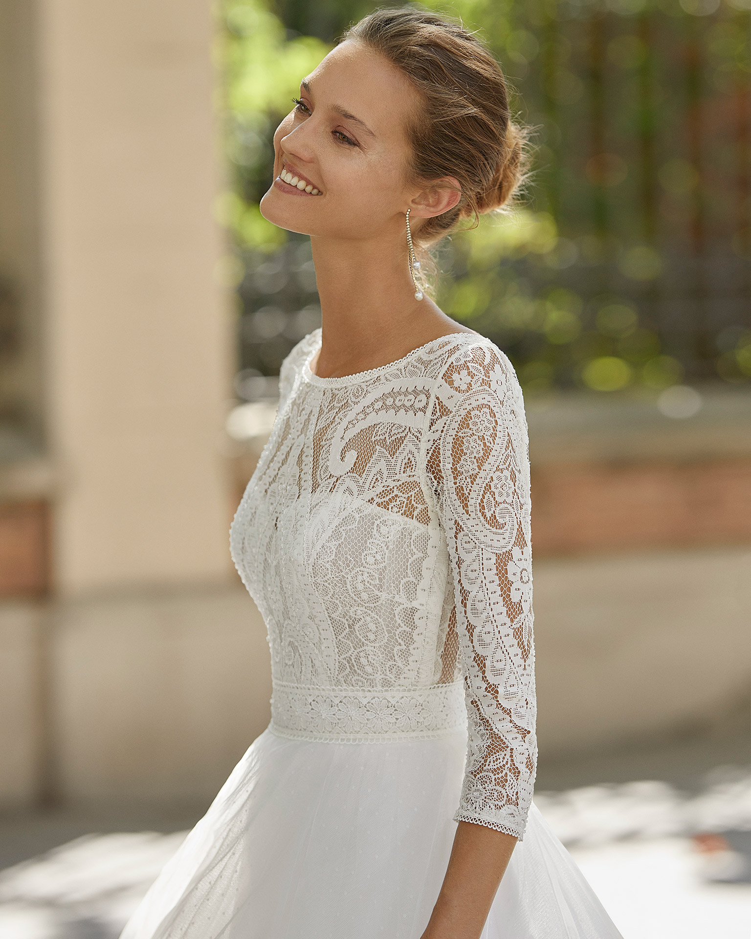 Romantic wedding dress, dot tulle and beaded lace. Boat neck, V-back and 3/4-length sleeves. 2022  Collection.
