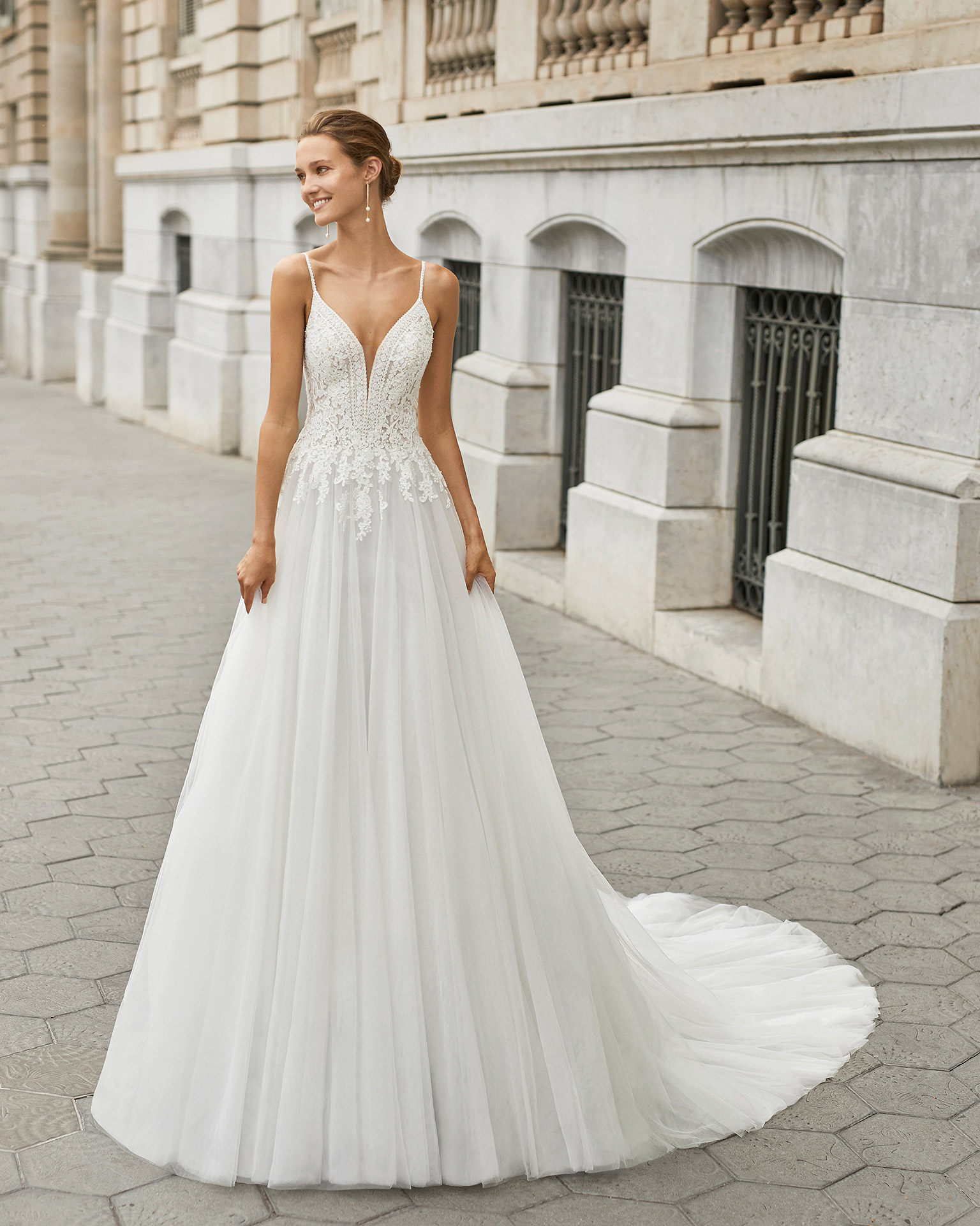 Elegant wedding dress, tulle and beaded lace. Deep-plunge neckline and V-back. 2022  Collection.