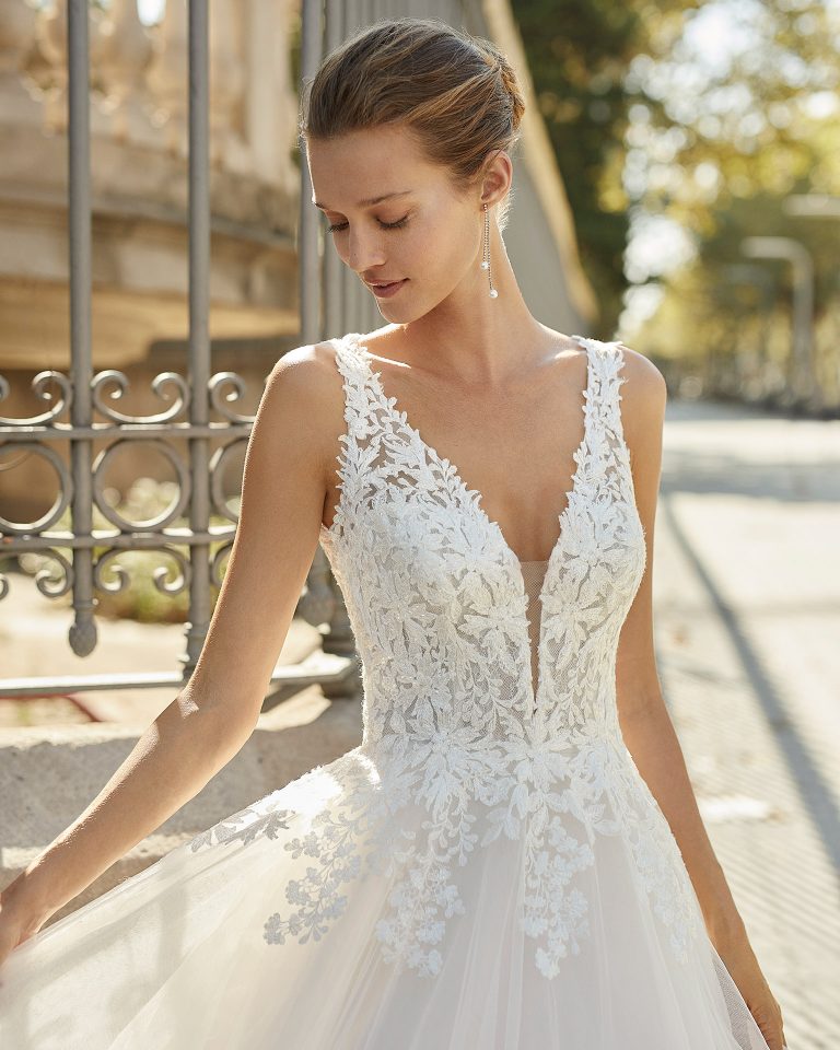 Romantic wedding dress, tulle and beaded lace. Deep-plunge neckline and low back. 2022 Collection.