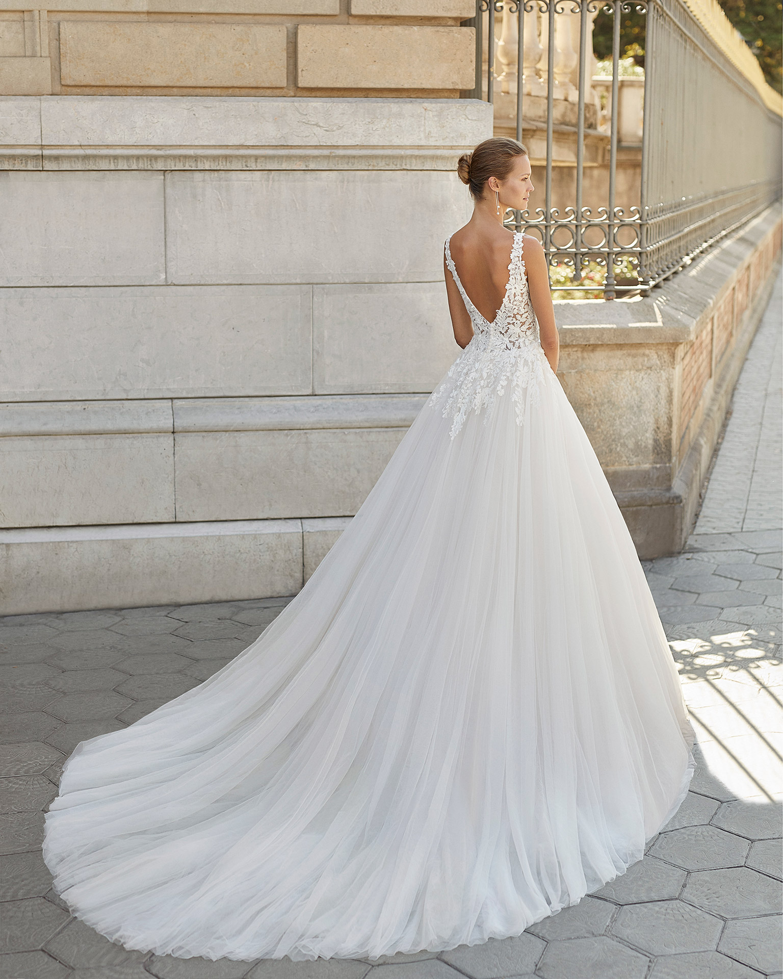 Romantic wedding dress, tulle and beaded lace. Deep-plunge neckline and low back. 2022  Collection.