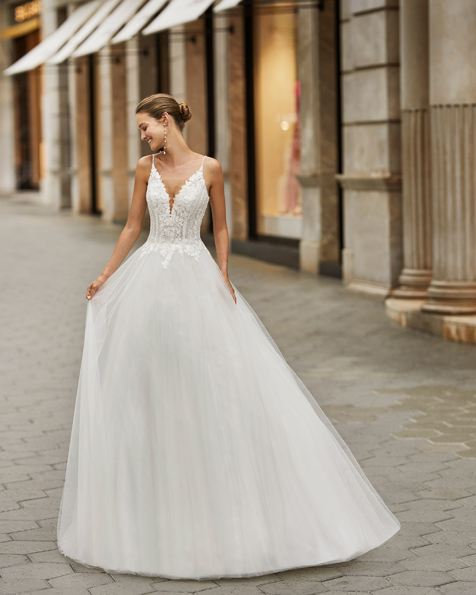 Romantic wedding dress, tulle and dot tulle underskirt, beaded lace. Deep-plunge neckline and V-back. 2022  Collection.