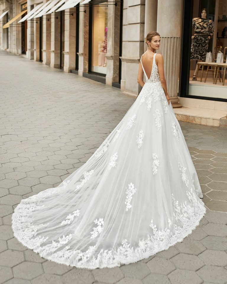 A line wedding dress, tulle, beaded lace. Deep-plunge neckline and V-back. 2022 Collection.