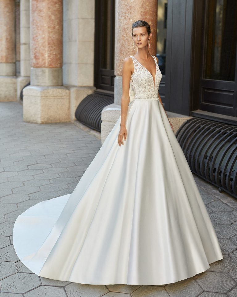 Classic wedding dress, satin, beaded lace. Deep-plunge neckline and low back. 2022  Collection.