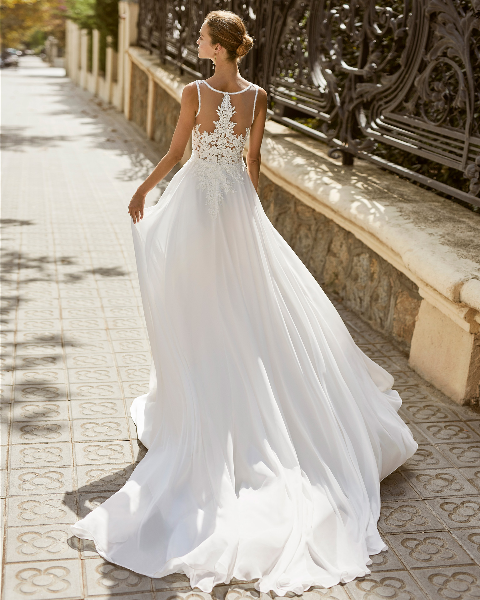 Lightweight wedding dress in voile and beaded lace. V-neck and lace appliqué back. 2022  Collection.