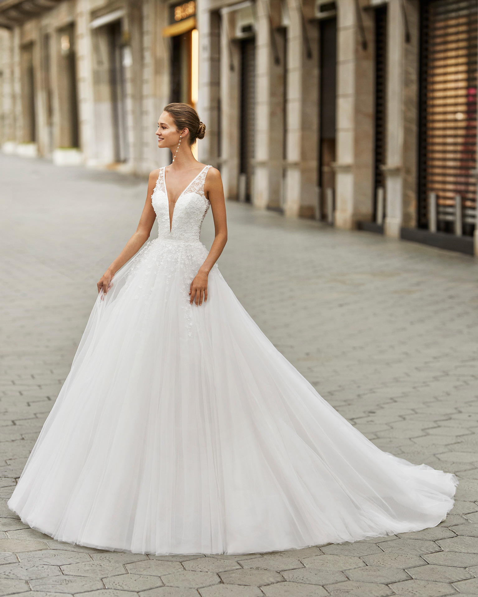 Romantic wedding dress, beaded tulle. Deep-plunge neckline and V-back. 2022  Collection.