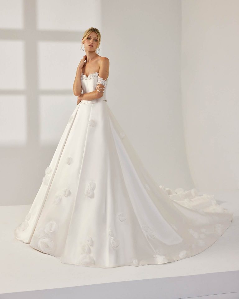 Vestido de novia largo de dos piezas con corte volumen. Mikado, escote corazón, tirantes caídos y espalda descubierta con falda con bolsillos. LUNA_NOVIAS.