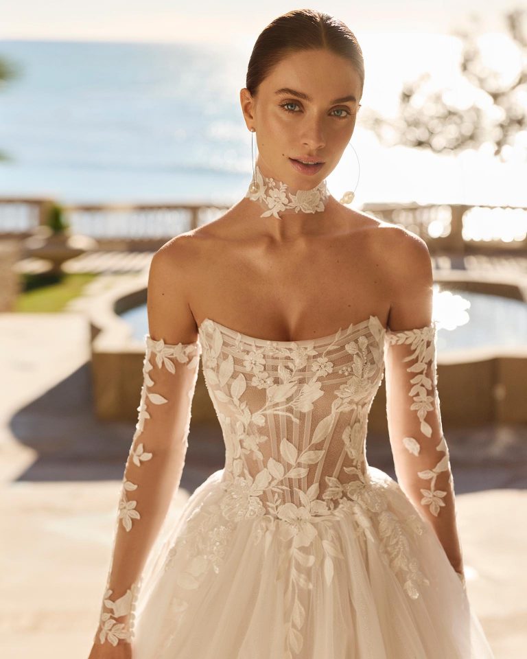 Princess silhouette wedding dress with strapless lace neckline with beading, tulle skirt with appliqués LUNA_NOVIAS.